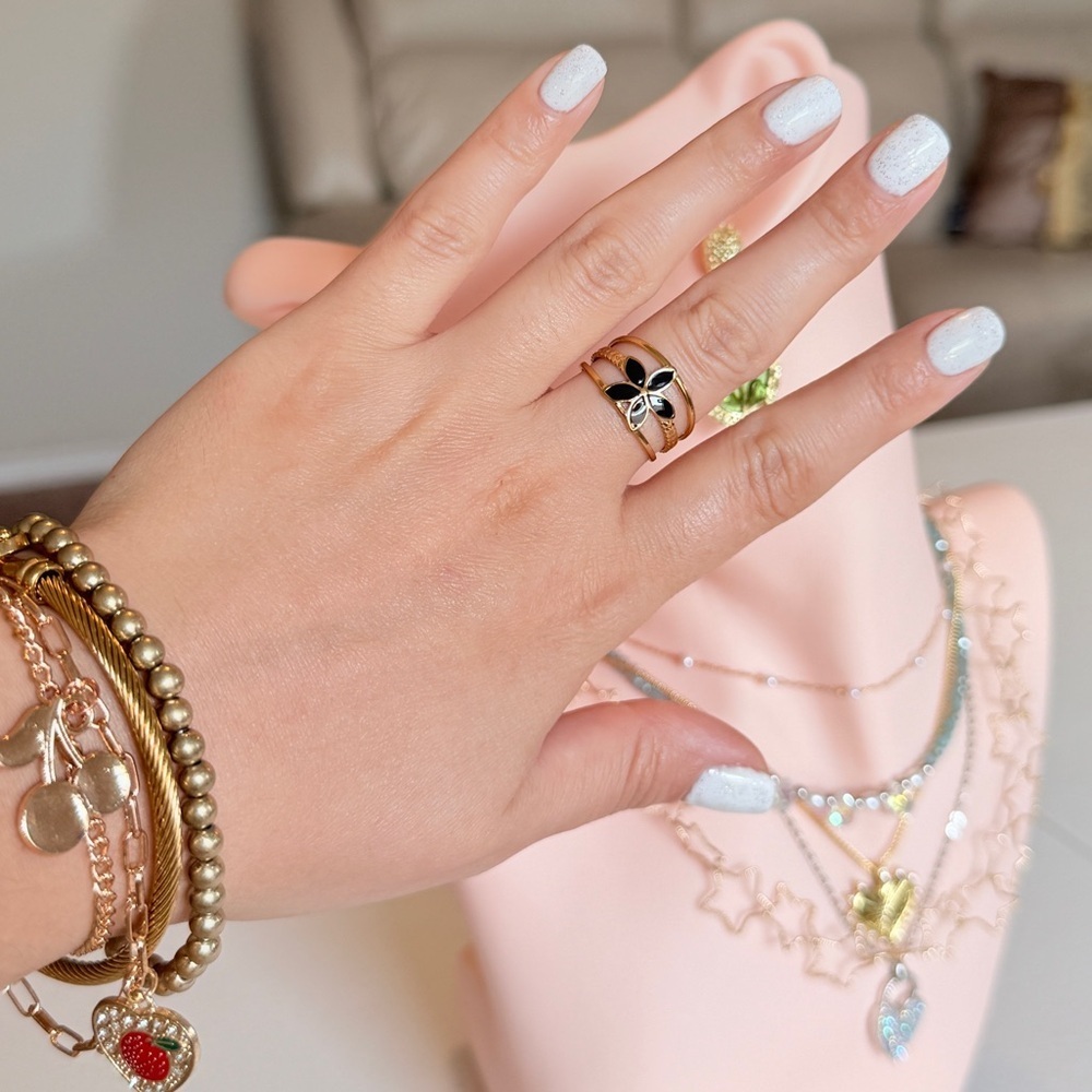Gold Clover Flower Ring with Black Enamel Accent